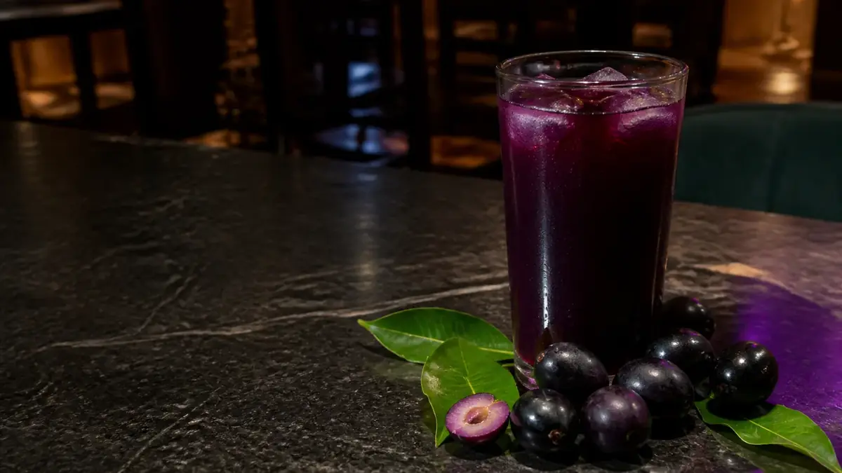 Deep purple Jamun juice with fresh Java plums